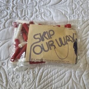Vintage "Skip Our Way" Red & White Beaded Skipping Rope - New Old Stock
